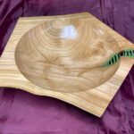 Woodturning by Kevin. Kevin is a master at woodturning - bowls, spoons, cups, platters, round boxes, rolling pins and many other fine objects.